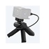 Sony Travel grip compatto con tre pulsanti di controllo (shutter / Video start/stop / Zoom) e funzione treppiede.