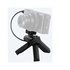 Sony Travel grip compatto con tre pulsanti di controllo (shutter / Video start/stop / Zoom) e funzione treppiede.